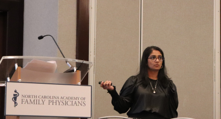 Dr. Puja Dalal presents at the Academic Summit.