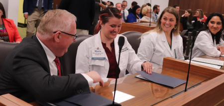 Greg Griggs with members at White Coat Wednesday