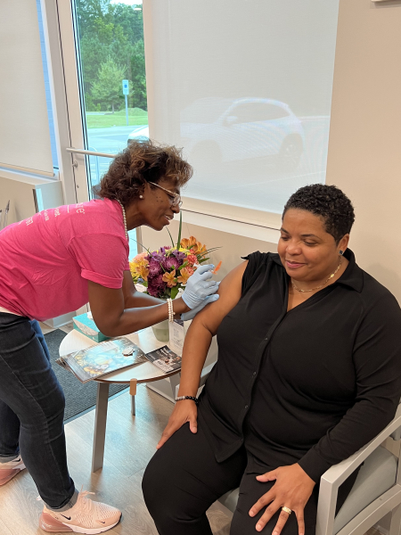 Dr. Ivery giving flu vaccines at the 9/30/2023 Avance Care anniversary party.